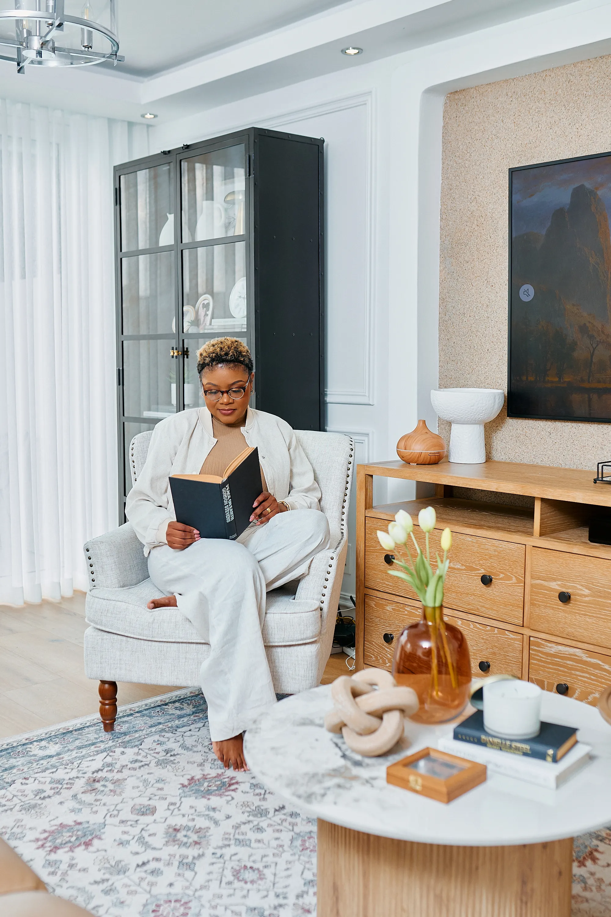 Residential interior by Epiphany Design House — warm, grounded living space